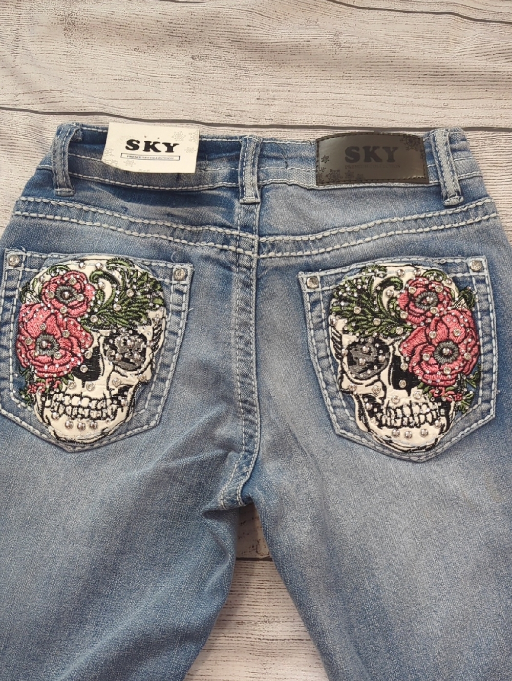 Sky Women's Light Blue Skinny Jeans with Embroidered Floral Skull Pockets
